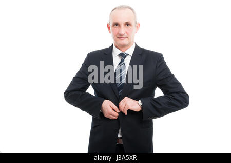 Porträt von eleganten Mann mittleren Alters knöpfte seine Jacke und lächelnd isoliert auf weißem Hintergrund mit textfreiraum text Stockfoto
