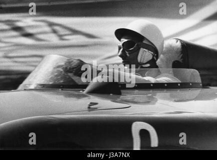 Stirling Moss in einem Rennwagen, 1960 Stockfoto