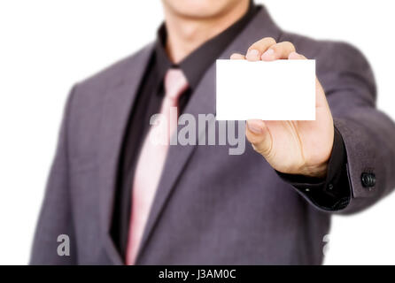 Geschäftsperson, die eine leere Visitenkarte. Stockfoto