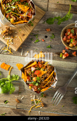 Hausgemachte Rindfleisch zu Fuß Taco in einer Tasche mit Chips Stockfoto