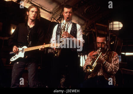 Die Mittelbindungen Jahr: 1991 - Irland/Großbritannien/USA Regie: Alan Parker Glen Hansard, Félim Gormley, Johnny Murphy Stockfoto