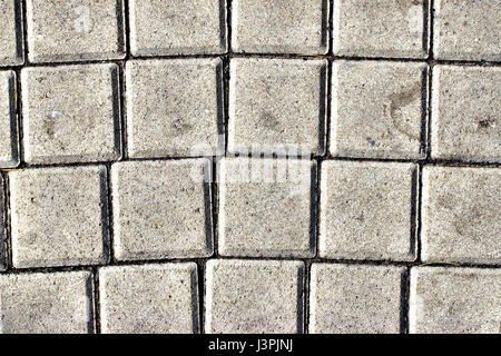 Pflastersteine, gemusterte Fliesen, Zement Ziegel Boden Hintergrund zu ebnen Stockfoto