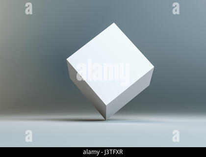 Ein weiße leere Cube steht an der Ecke Stockfoto