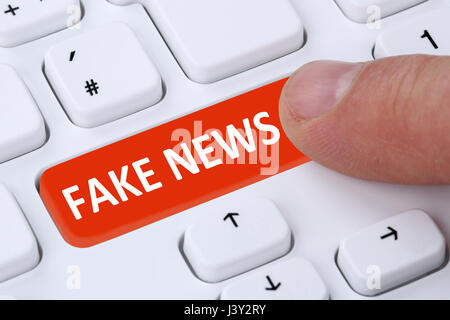 Gefälschte Nachrichten Wahrheit Lüge Medien Internet Online-Finger Computer Tastatur Schaltflächensymbol Stockfoto