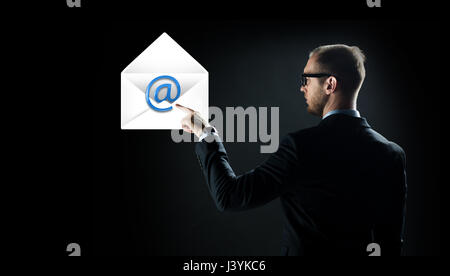 Geschäftsmann Zeigefinger Stockfoto