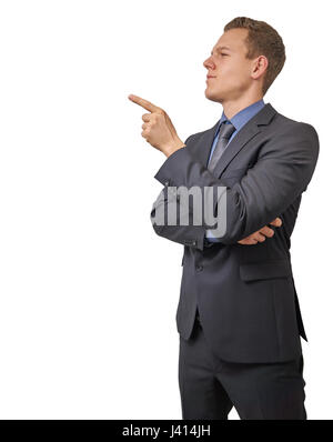 Junger Geschäftsmann Punkte mit dem Finger auf seinem Recht - mit Exemplar isoliert. Skeptisch, kritisch oder Analyse Ausdruck für Werbung. Stockfoto