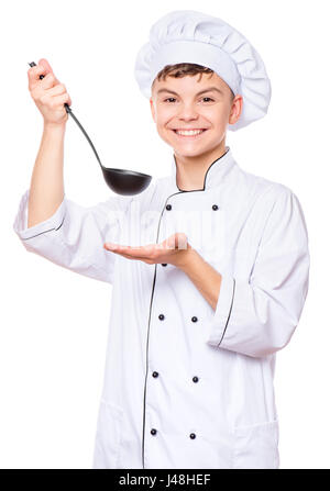 Teenboy tragen Chef uniform Stockfoto