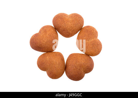 Honig in Herzform Cookies isoliert auf weißem Hintergrund. Stockfoto