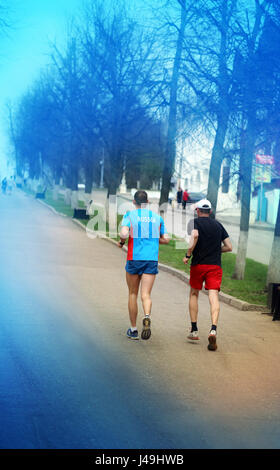 Zwei Athleten laufen Stockfoto