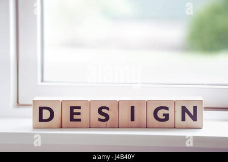 Design-Schild mit Buchstaben Holz Stockfoto