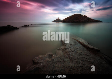 Sonnenuntergang am Leuchtturm Mumbles Stockfoto