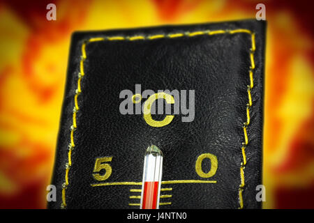 Thermometer fifty celsius, with fire background Stockfoto