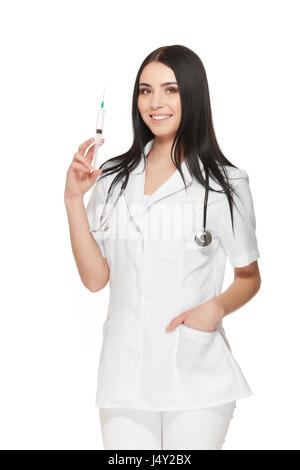 Ein Porträt von einer jungen Ärztin lächelnd mit einer Spritze in der hand Stockfoto