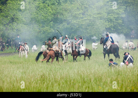 Revolutionärer Krieg-Re-enactment auf dem Pferderücken - USA Stockfoto