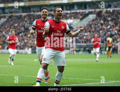 LUKAS PODOLSKI feiert MAKI HULL CITY V ARSENAL KC STADIUM HULL ENGLAND 20. April 2014 Stockfoto