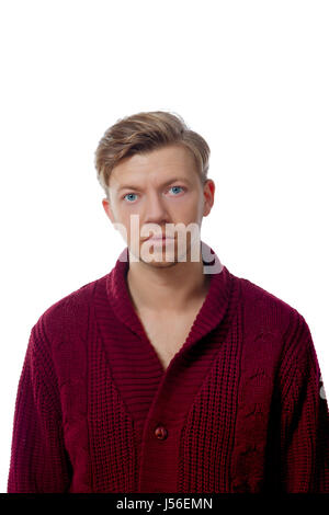 Bild von einem jungen Mann in einem braunen Pullover gekleidet Stockfoto