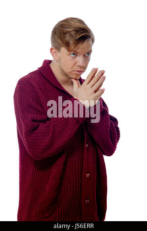 Bild von einem jungen Mann in einem braunen Pullover gekleidet Stockfoto