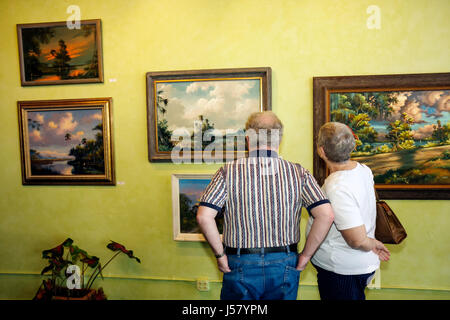 Florida Mt. Mount Dora, Donnelly Park, Florida Highwaymen Art Show, Künstler, Alfred Hair, Erwachsene Erwachsene Erwachsene Männer Männer männlich, Frau Frauen weibliche Dame, Paar, Senior se Stockfoto