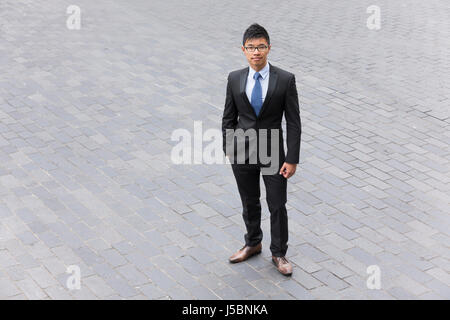Erhöhte Ansicht eines chinesischen Kaufmanns stehen auf der Straße. Stockfoto