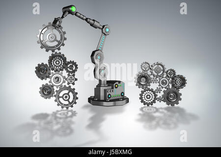 Roboter, die Zahnräder in Verbindung setzen Stockfoto