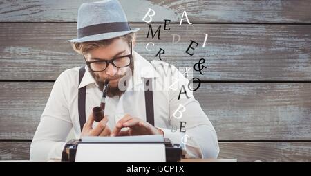 Digital Composite Hipster mit Schreibmaschine während Pfeife gegen Holzwand Stockfoto