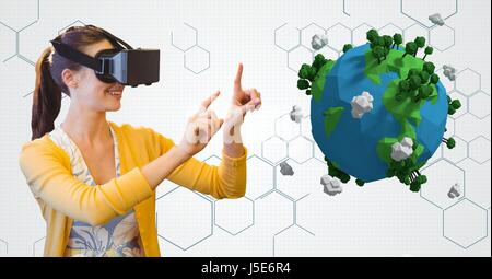 Digital Composite Frau VR Brille beim gestikulieren durch low-Poly-Erde Stockfoto