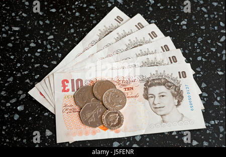 Nahaufnahme von englischem Geld £10-Schein Bargeld Banknoten 10-Pfund-Banknoten und Münzen England Großbritannien Großbritannien Großbritannien Großbritannien Großbritannien Großbritannien Großbritannien Großbritannien Großbritannien Großbritannien Großbritannien Großbritannien Großbritannien Großbritannien Großbritannien Großbritannien Stockfoto