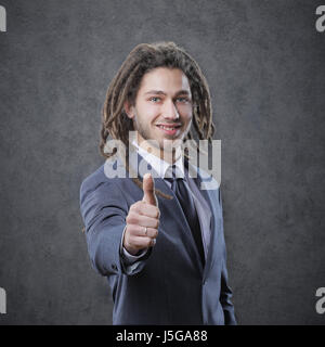 Glücklich Kaufmann seine Daumen auftauchen Stockfoto