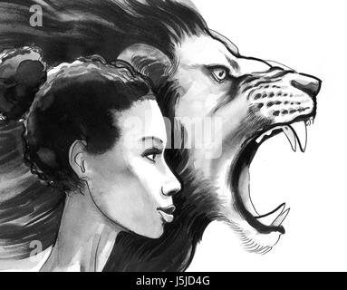 Schöne schwarze Frau und ein Löwe Stockfoto