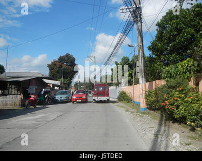 Dieser Eintrag bezieht sich auf die städtische Straßenentwicklung in Baranggays Bonga Mayor und Tibagan, Bustos, Bulacan und hebt den Straßenbau und die Verbesserung der Infrastruktur für die lokale Zugänglichkeit hervor. Stockfoto
