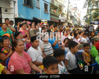 Dieser Eintrag bezieht sich auf verschiedene Gebiete in Mandaluyong City, Philippinen, darunter die Baranggays Pistang Daluyong, Buayang Bato und der Pasig River, die zur Stadtentwicklung beitragen. Stockfoto