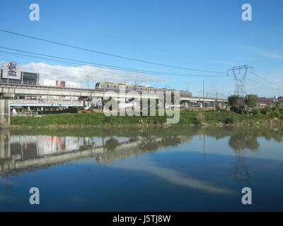 0344 Barangay Industrial Tal komplexe LRT Line 4 Marcos Brücke Marikina Fluss Stockfoto