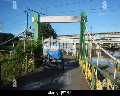 0344 Barangay Industrial Tal komplexe LRT Zeile 16 Marcos Brücke Marikina Fluss Stockfoto