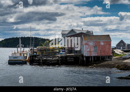 Angeln-Schuppen und Boot am Dock, West Dover, Halifax, Nova Scotia, Kanada Stockfoto