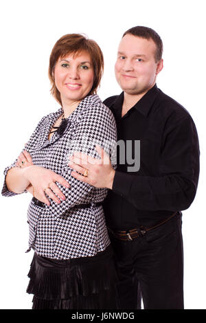 Fröhliche applying paar zusammen isoliert auf weiss Stockfoto