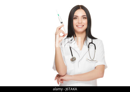 Schöne Krankenschwester im Krankenhaus posiert mit Spritze in der hand. Stockfoto