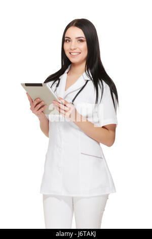 Positivität Ärztin mit Tablet und lächelt in die Kamera. Stockfoto