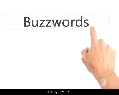 Schlagworte - Hand drücken einer Taste auf unscharfen Hintergrund Konzept. Wirtschaft, Technologie, Internet-Konzept. Stock Foto Stockfoto
