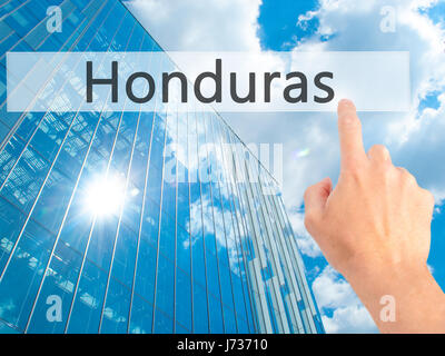 Honduras - Hand drücken einer Taste auf unscharfen Hintergrund Konzept. Wirtschaft, Technologie, Internet-Konzept. Stock Foto Stockfoto