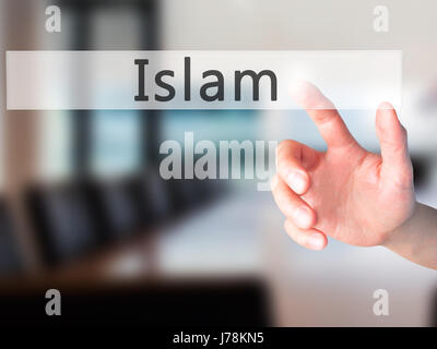 Islam - Hand drücken einer Taste auf unscharfen Hintergrund Konzept. Wirtschaft, Technologie, Internet-Konzept. Stock Foto Stockfoto