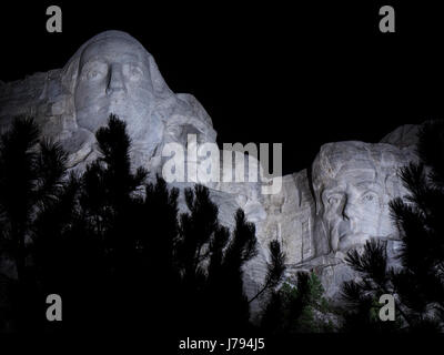 Gesichter bei Nacht, Mount Rushmore National Memorial, South Dakota. Stockfoto