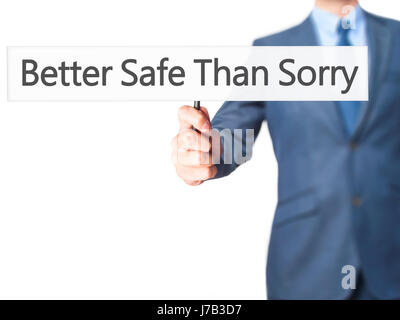 Better Safe Than Sorry - Geschäftsmann Hand mit Schild. Wirtschaft, Technologie, Internet-Konzept. Stock Foto Stockfoto