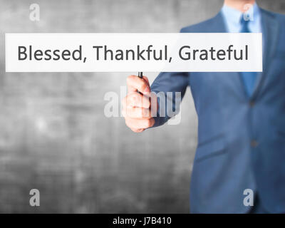 Gesegnet, dankbar Grateful - Geschäftsmann Hand mit Schild. Wirtschaft, Technologie, Internet-Konzept. Stock Foto Stockfoto