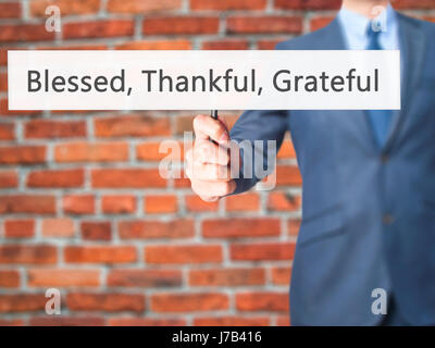 Gesegnet, dankbar Grateful - Geschäftsmann Hand mit Schild. Wirtschaft, Technologie, Internet-Konzept. Stock Foto Stockfoto