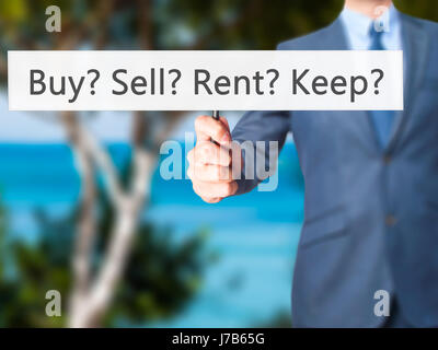 Kaufen? Zu verkaufen? Mieten? Zu halten? -Business Mann zeigt Zeichen. Wirtschaft, Technologie, Internet-Konzept. Stock Foto Stockfoto