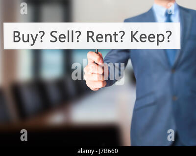 Kaufen? Zu verkaufen? Mieten? Zu halten? -Business Mann zeigt Zeichen. Wirtschaft, Technologie, Internet-Konzept. Stock Foto Stockfoto