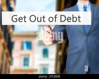 Get out of Debt - Geschäftsmann zeigen Zeichen. Wirtschaft, Technologie, Internet-Konzept. Stock Foto Stockfoto