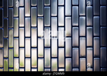 Graue metallische dekorative Wand-Platte Stockfoto