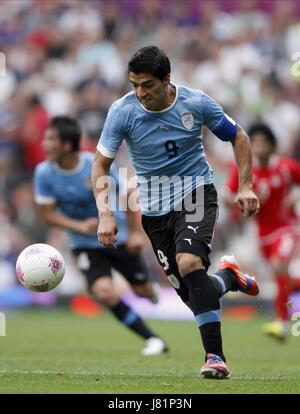 LUIS SUAREZ URUGUAY & FC LIVERPOOL LONDON 2012 Olympische Spiele Herren Fußball, UA Emirate V URUGUAY OLD TRAFFORD, MANCHESTER, ENGLAND 26. Juli 2012 GAN55665 Warnung! Dieses Foto kann nur für die Zeitung bzw. Zeitschrift redaktionelle Zwecke verwendet werden. Kann nicht werden verwendet für Publikationen unter Einbeziehung 1 Spieler, 1 Club oder 1 Wettbewerb ohne schriftliche Genehmigung von Football DataCo Ltd. Für Rückfragen, bitte Kontakt Football DataCo Ltd unter + 44 (0) 207 864 9121 Stockfoto