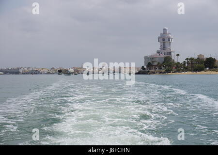 Leuchtturm Isla Cristina Spanien Costa de la Luz mit dem Boot Stockfoto